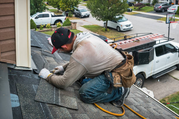 Professional Roofing technician working in Ashville, PA